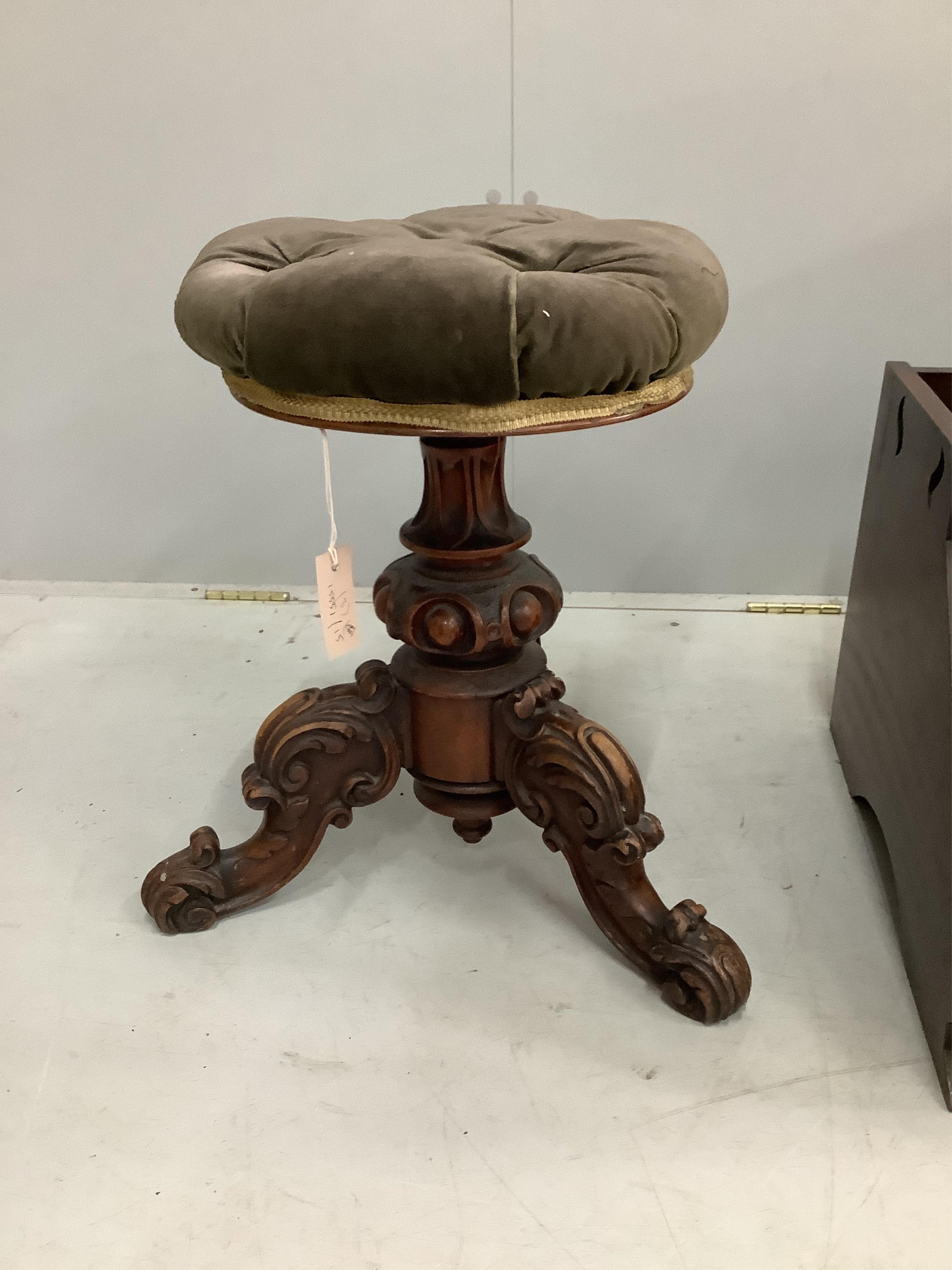 A Victorian circular adjustable piano stool, a late Victorian coal scuttle and an Edwardian drop flap occasional table. Condition - fair